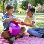 A Boy Giving His Friend a Birthday Gift