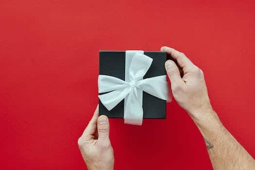 Black Gift Box With White Ribbon