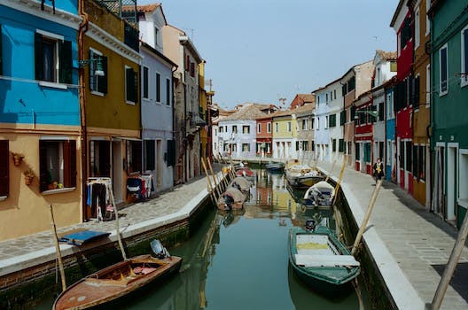 Colorful houses along narrow town canal