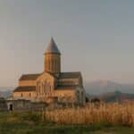 Old stone cathedral located in countryside
